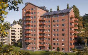 Visualiseringsbild på ett av husen i Östra Kålltorp. Huset är ett flerfamiljshus med röd tegelfasad.